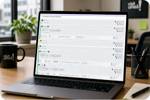 Visit Umeå emissions workflow displayed on a laptop in an office